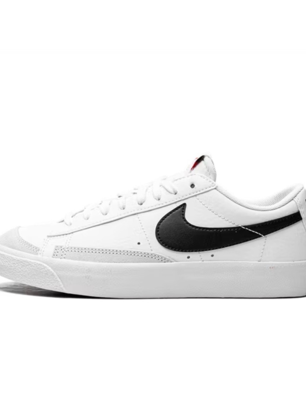 Nike White Low-Top Sneakers with Black Swoosh